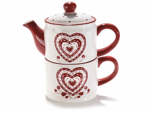 Teiera e tazza in ceramica con decori a cuore in rilievo  Misure: cm 17 x 9,5 x 17,5 H