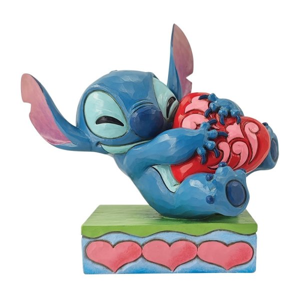 Stitch che abbraccia un cuore