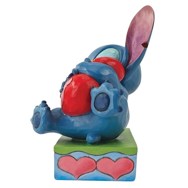 Stitch che abbraccia un cuore