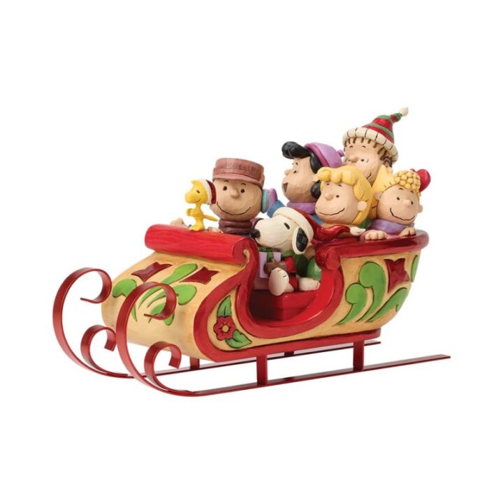 statuetta di snoopy e amici sulla slitta peanuts di jim shore