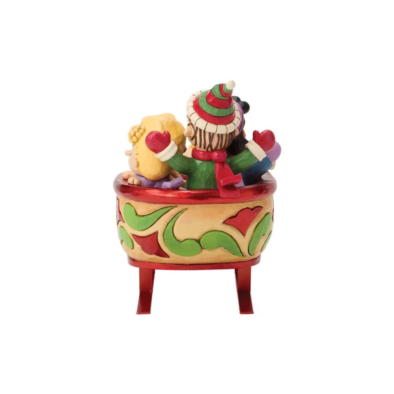 statuetta di snoopy e amici sulla slitta peanuts di jim shore