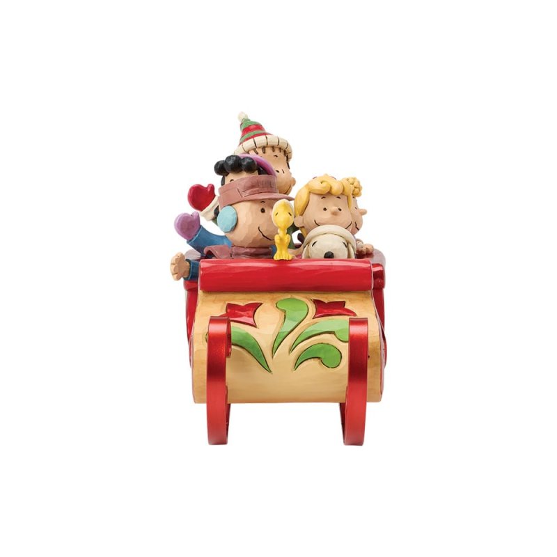 statuetta di snoopy e amici sulla slitta peanuts di jim shore