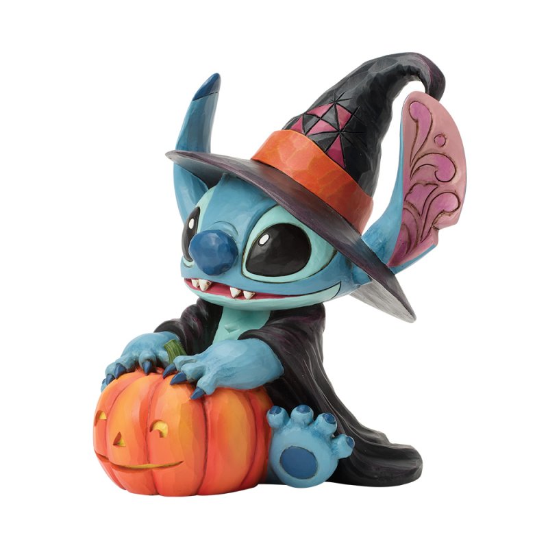 statuetta di stitch strega con zucca intagliata disney traditions