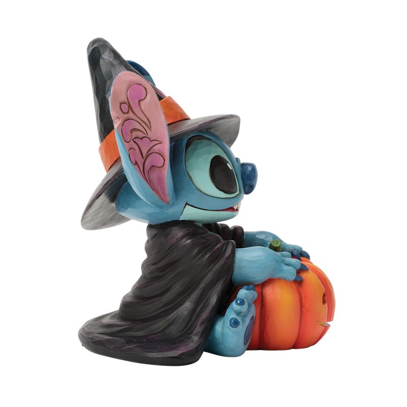 statuetta di stitch strega con zucca intagliata disney traditions